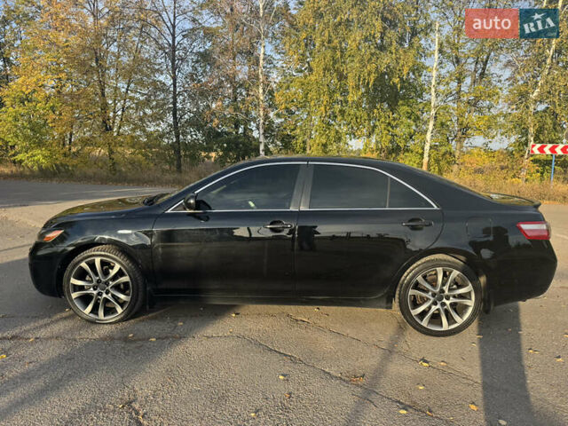 Черный Тойота Камри, объемом двигателя 3.46 л и пробегом 337 тыс. км за 9000 $, фото 1 на Automoto.ua