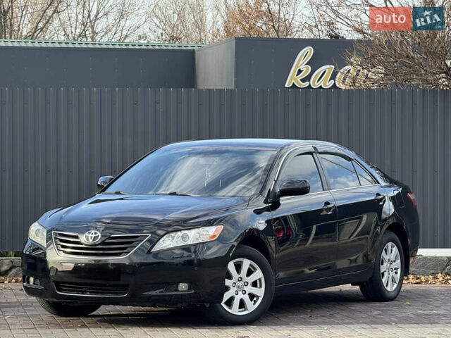 Черный Тойота Камри, объемом двигателя 2.36 л и пробегом 249 тыс. км за 8950 $, фото 1 на Automoto.ua