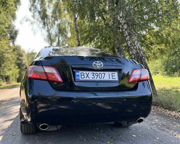Чорний Тойота Камрі, об'ємом двигуна 3.46 л та пробігом 310 тис. км за 7499 $, фото 1 на Automoto.ua