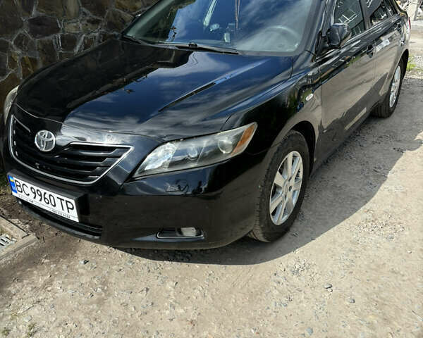 Черный Тойота Камри, объемом двигателя 2.36 л и пробегом 306 тыс. км за 7900 $, фото 1 на Automoto.ua
