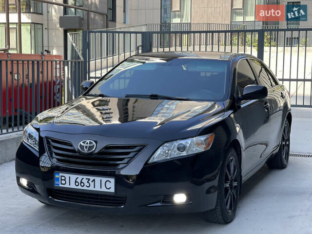 Черный Тойота Камри, объемом двигателя 2.36 л и пробегом 275 тыс. км за 6999 $, фото 1 на Automoto.ua