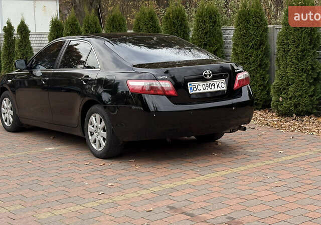 Черный Тойота Камри, объемом двигателя 2.36 л и пробегом 308 тыс. км за 7400 $, фото 1 на Automoto.ua