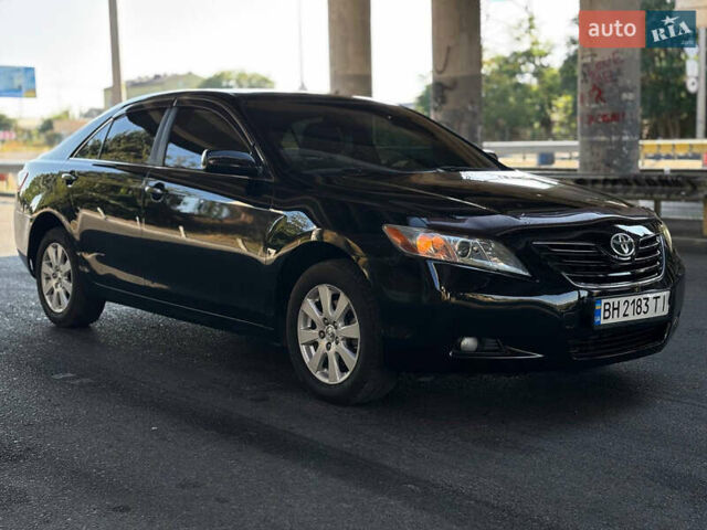 Чорний Тойота Камрі, об'ємом двигуна 2.4 л та пробігом 140 тис. км за 7999 $, фото 1 на Automoto.ua