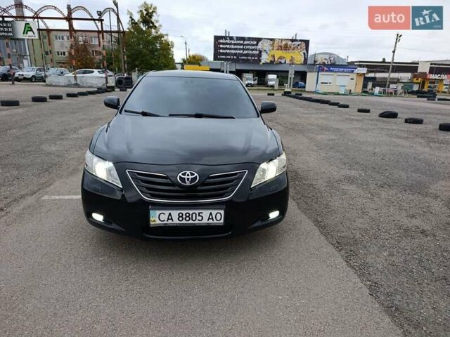 Черный Тойота Камри, объемом двигателя 2.4 л и пробегом 268 тыс. км за 8800 $, фото 1 на Automoto.ua