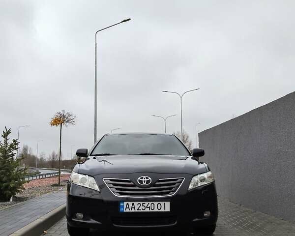 Черный Тойота Камри, объемом двигателя 2.36 л и пробегом 172 тыс. км за 11100 $, фото 1 на Automoto.ua