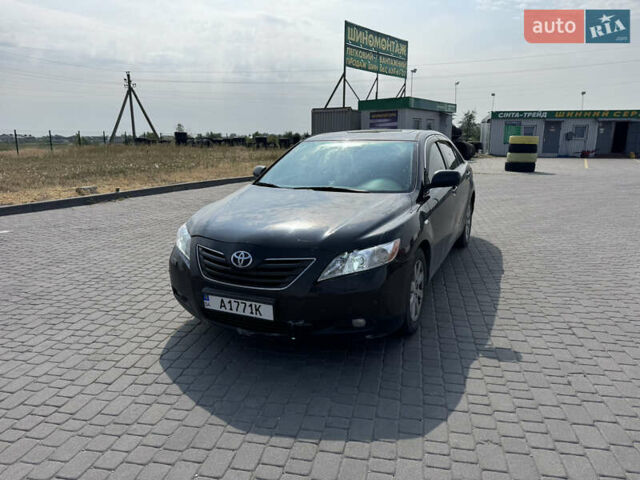 Черный Тойота Камри, объемом двигателя 2.36 л и пробегом 388 тыс. км за 6300 $, фото 1 на Automoto.ua