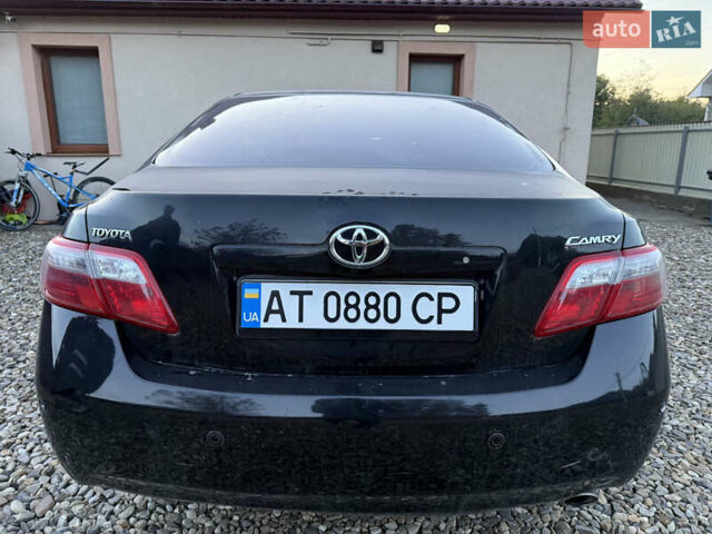 Черный Тойота Камри, объемом двигателя 2.36 л и пробегом 180 тыс. км за 8000 $, фото 1 на Automoto.ua