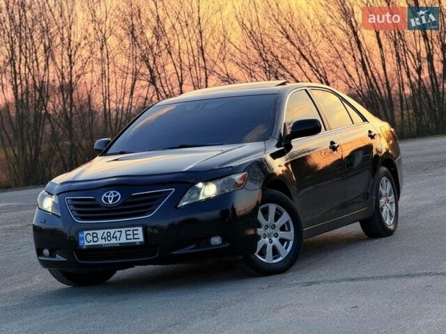 Черный Тойота Камри, объемом двигателя 2.4 л и пробегом 345 тыс. км за 8200 $, фото 1 на Automoto.ua