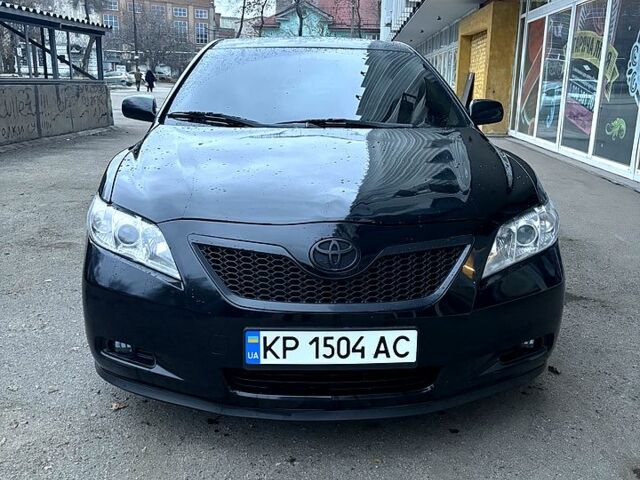 Чорний Тойота Камрі, об'ємом двигуна 2.4 л та пробігом 357 тис. км за 5900 $, фото 1 на Automoto.ua