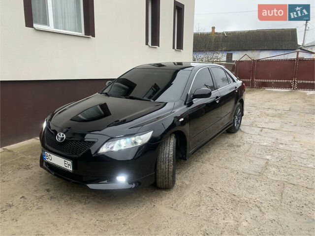 Черный Тойота Камри, объемом двигателя 2.4 л и пробегом 237 тыс. км за 8700 $, фото 1 на Automoto.ua