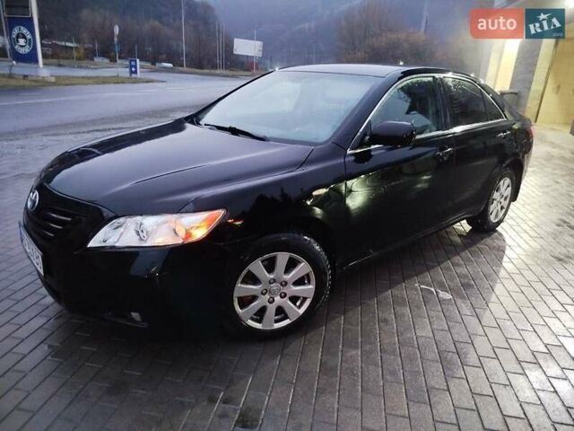 Черный Тойота Камри, объемом двигателя 2.36 л и пробегом 245 тыс. км за 8300 $, фото 1 на Automoto.ua