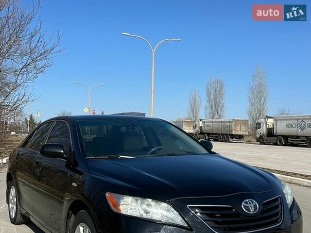 Черный Тойота Камри, объемом двигателя 2.36 л и пробегом 214 тыс. км за 7800 $, фото 1 на Automoto.ua