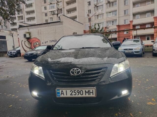 Чорний Тойота Камрі, об'ємом двигуна 2.4 л та пробігом 292 тис. км за 6995 $, фото 1 на Automoto.ua