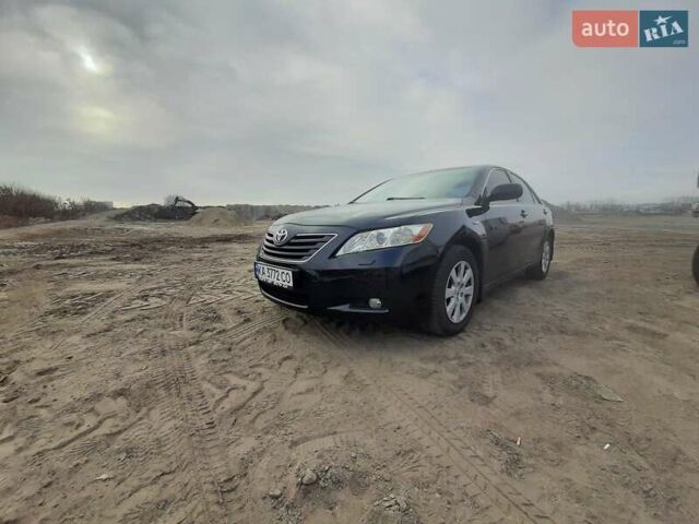 Черный Тойота Камри, объемом двигателя 2.4 л и пробегом 320 тыс. км за 10000 $, фото 1 на Automoto.ua