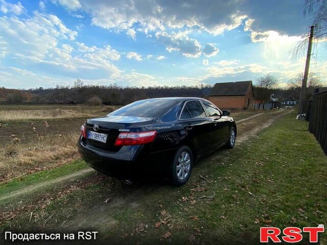 Черный Тойота Камри, объемом двигателя 2.4 л и пробегом 203 тыс. км за 8800 $, фото 1 на Automoto.ua