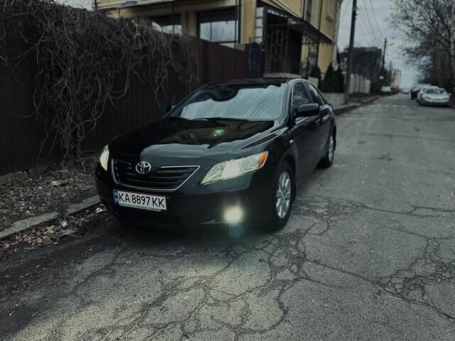 Черный Тойота Камри, объемом двигателя 2.4 л и пробегом 265 тыс. км за 8800 $, фото 1 на Automoto.ua
