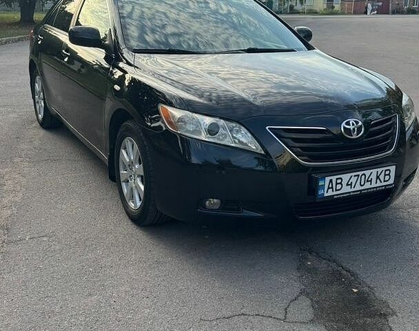 Чорний Тойота Камрі, об'ємом двигуна 2.4 л та пробігом 280 тис. км за 9800 $, фото 1 на Automoto.ua