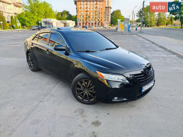 Черный Тойота Камри, объемом двигателя 3.5 л и пробегом 330 тыс. км за 9000 $, фото 1 на Automoto.ua