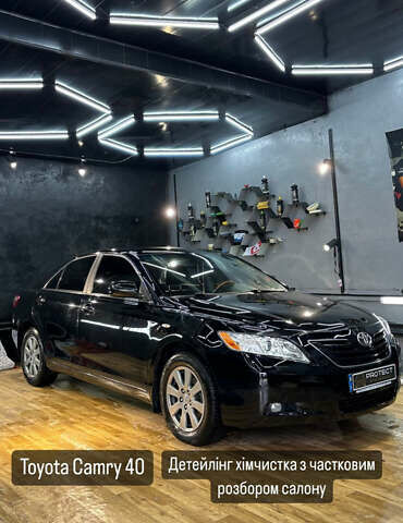 Черный Тойота Камри, объемом двигателя 3.46 л и пробегом 233 тыс. км за 10500 $, фото 1 на Automoto.ua