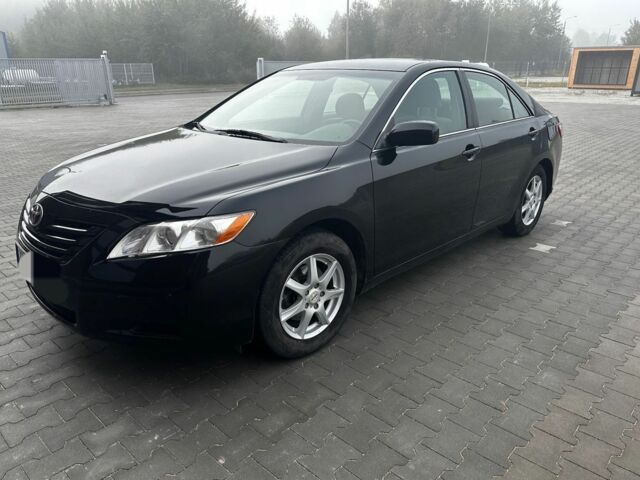 Чорний Тойота Камрі, об'ємом двигуна 2.4 л та пробігом 210 тис. км за 4550 $, фото 1 на Automoto.ua