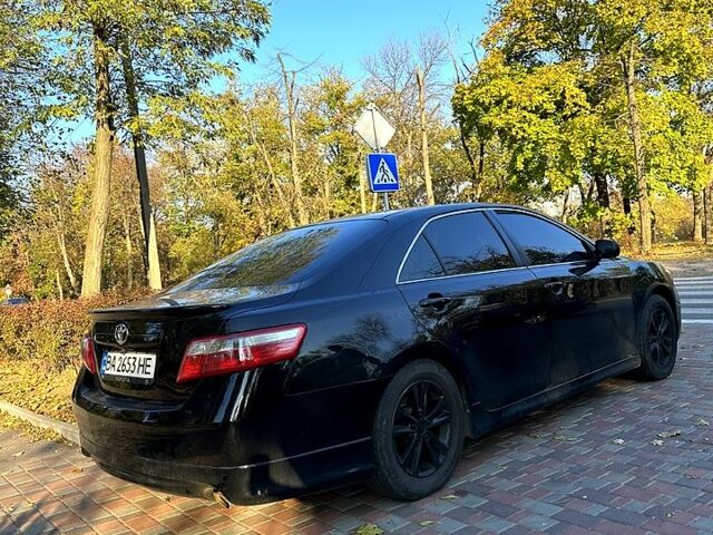 Черный Тойота Камри, объемом двигателя 3.5 л и пробегом 305 тыс. км за 7499 $, фото 1 на Automoto.ua