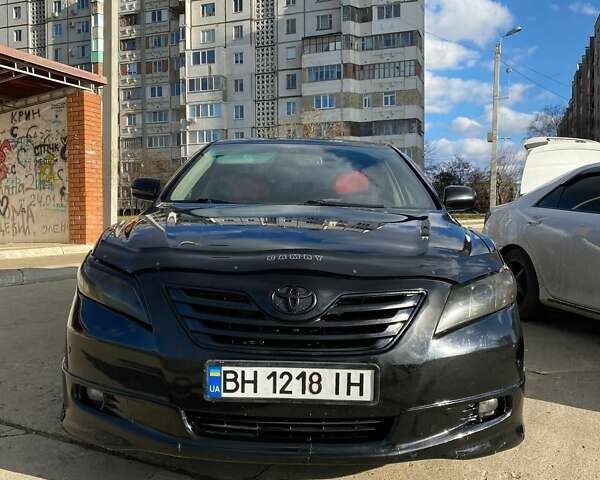 Черный Тойота Камри, объемом двигателя 2.4 л и пробегом 286 тыс. км за 8000 $, фото 1 на Automoto.ua