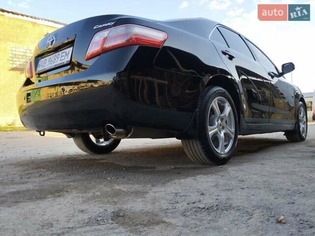 Черный Тойота Камри, объемом двигателя 2.36 л и пробегом 233 тыс. км за 8350 $, фото 1 на Automoto.ua