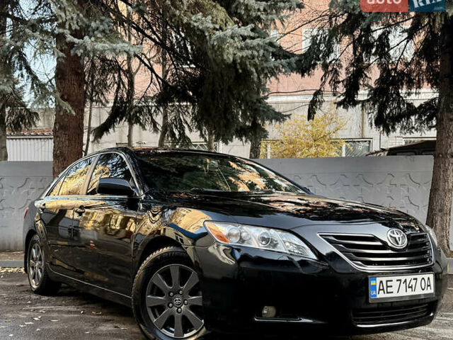 Черный Тойота Камри, объемом двигателя 3.46 л и пробегом 198 тыс. км за 10000 $, фото 1 на Automoto.ua