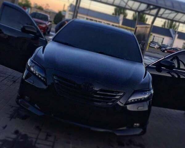 Черный Тойота Камри, объемом двигателя 3.5 л и пробегом 260 тыс. км за 12000 $, фото 1 на Automoto.ua