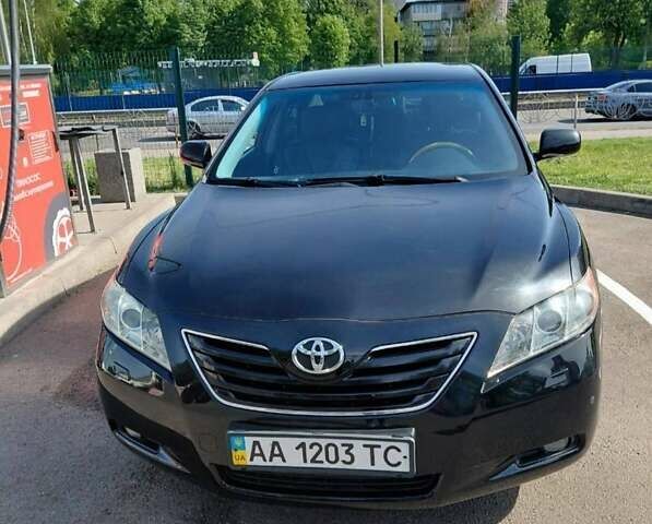 Черный Тойота Камри, объемом двигателя 3.46 л и пробегом 312 тыс. км за 13580 $, фото 1 на Automoto.ua