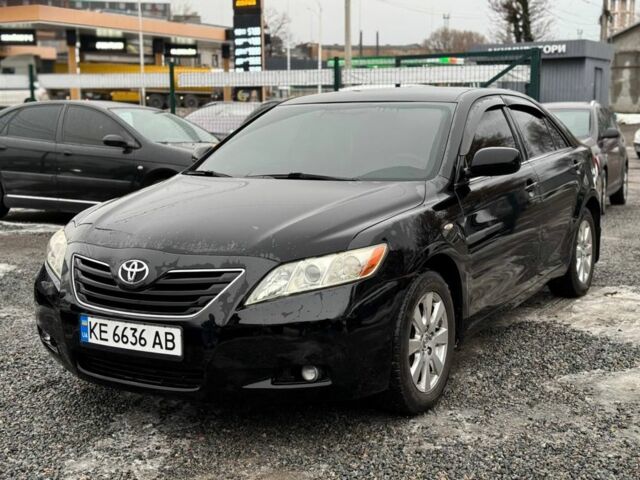 Черный Тойота Камри, объемом двигателя 2.4 л и пробегом 257 тыс. км за 7950 $, фото 1 на Automoto.ua