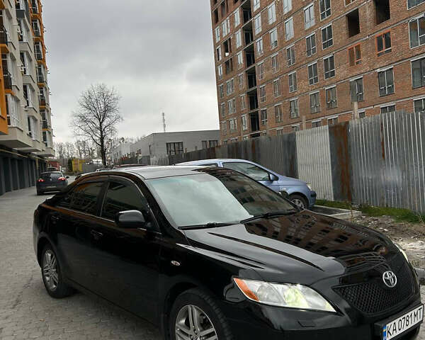 Черный Тойота Камри, объемом двигателя 2.36 л и пробегом 350 тыс. км за 6700 $, фото 1 на Automoto.ua