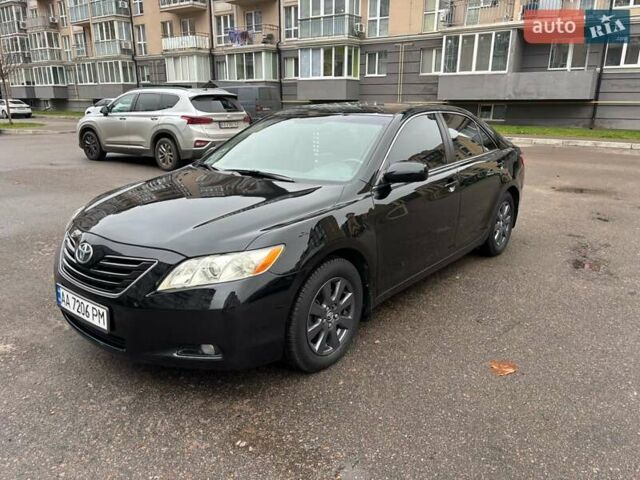Черный Тойота Камри, объемом двигателя 3.5 л и пробегом 255 тыс. км за 9900 $, фото 1 на Automoto.ua