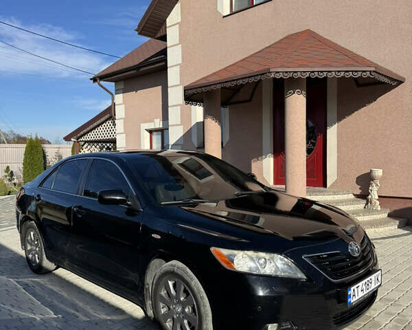 Чорний Тойота Камрі, об'ємом двигуна 3.46 л та пробігом 153 тис. км за 11200 $, фото 1 на Automoto.ua