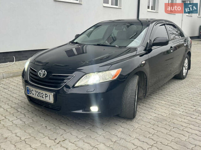 Чорний Тойота Камрі, об'ємом двигуна 2.36 л та пробігом 302 тис. км за 8500 $, фото 1 на Automoto.ua