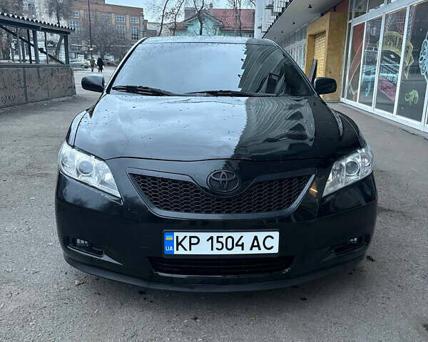 Черный Тойота Камри, объемом двигателя 2.36 л и пробегом 357 тыс. км за 6900 $, фото 1 на Automoto.ua