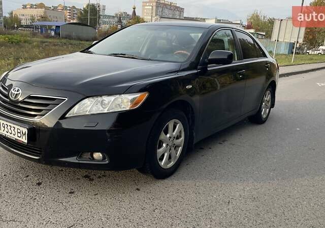 Черный Тойота Камри, объемом двигателя 2.36 л и пробегом 190 тыс. км за 8000 $, фото 1 на Automoto.ua