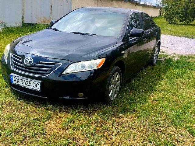 Черный Тойота Камри, объемом двигателя 2.4 л и пробегом 250 тыс. км за 6799 $, фото 1 на Automoto.ua