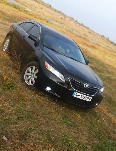 Чорний Тойота Камрі, об'ємом двигуна 2.4 л та пробігом 270 тис. км за 8500 $, фото 1 на Automoto.ua