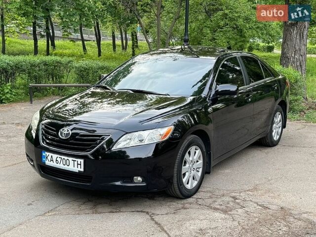 Черный Тойота Камри, объемом двигателя 2.36 л и пробегом 222 тыс. км за 9700 $, фото 1 на Automoto.ua