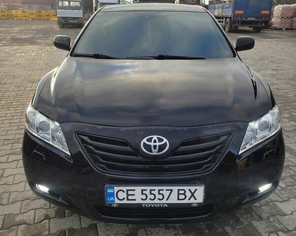 Черный Тойота Камри, объемом двигателя 3.5 л и пробегом 255 тыс. км за 11800 $, фото 1 на Automoto.ua