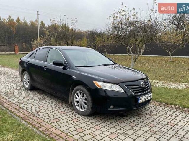 Черный Тойота Камри, объемом двигателя 2.4 л и пробегом 227 тыс. км за 8600 $, фото 1 на Automoto.ua
