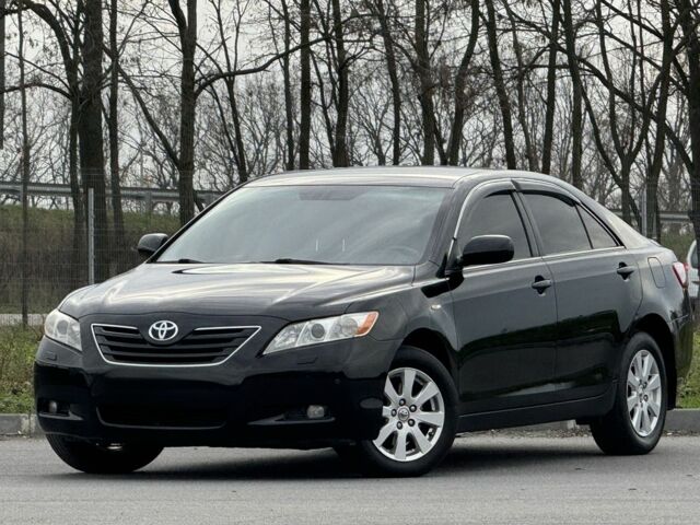 Чорний Тойота Камрі, об'ємом двигуна 2.4 л та пробігом 192 тис. км за 10500 $, фото 1 на Automoto.ua