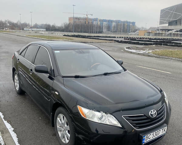 Черный Тойота Камри, объемом двигателя 3.5 л и пробегом 252 тыс. км за 10200 $, фото 1 на Automoto.ua