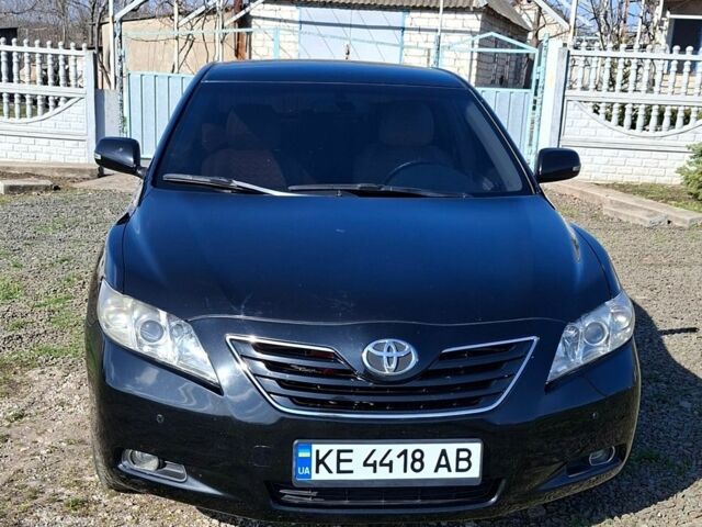 Чорний Тойота Камрі, об'ємом двигуна 2.4 л та пробігом 218 тис. км за 7300 $, фото 1 на Automoto.ua