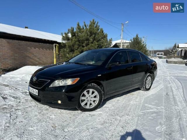 Черный Тойота Камри, объемом двигателя 2.4 л и пробегом 280 тыс. км за 7799 $, фото 1 на Automoto.ua
