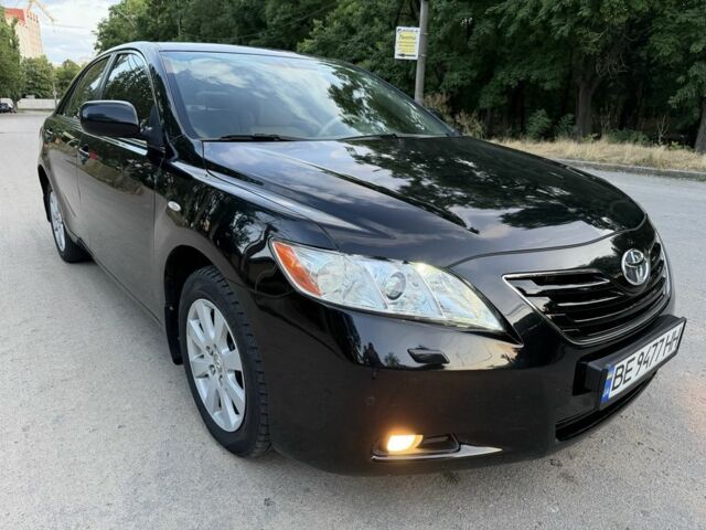 Черный Тойота Камри, объемом двигателя 2.4 л и пробегом 216 тыс. км за 6650 $, фото 1 на Automoto.ua