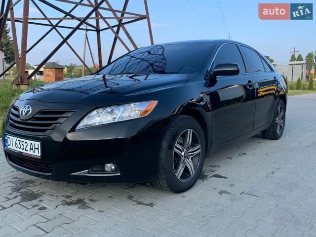 Черный Тойота Камри, объемом двигателя 2.36 л и пробегом 236 тыс. км за 8500 $, фото 1 на Automoto.ua