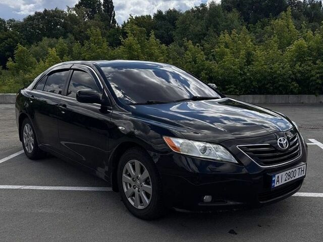 Черный Тойота Камри, объемом двигателя 2.4 л и пробегом 218 тыс. км за 8500 $, фото 1 на Automoto.ua