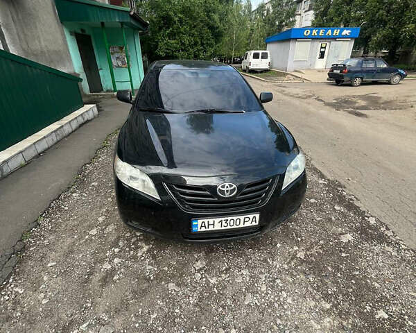 Черный Тойота Камри, объемом двигателя 2.4 л и пробегом 345 тыс. км за 6800 $, фото 1 на Automoto.ua